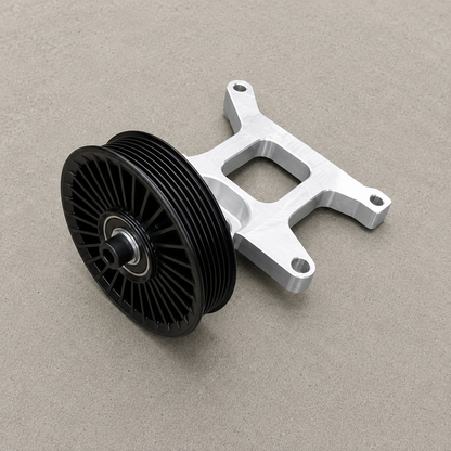 Assembled GR Yaris AC delete kit showing aluminium bracket and auxiliary belt pulley