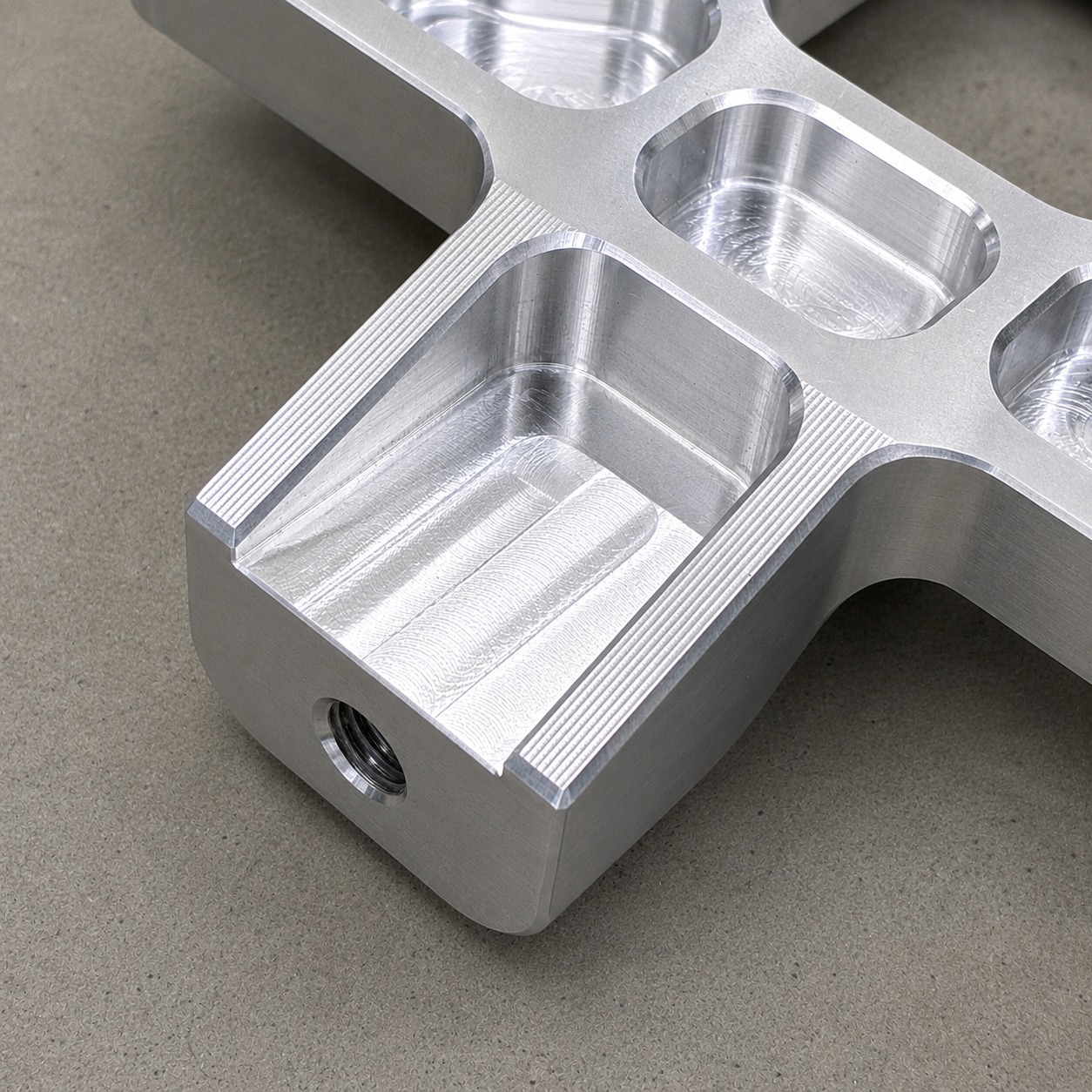 Close up of CNC machined mounting section on GR Yaris AC delete bracket