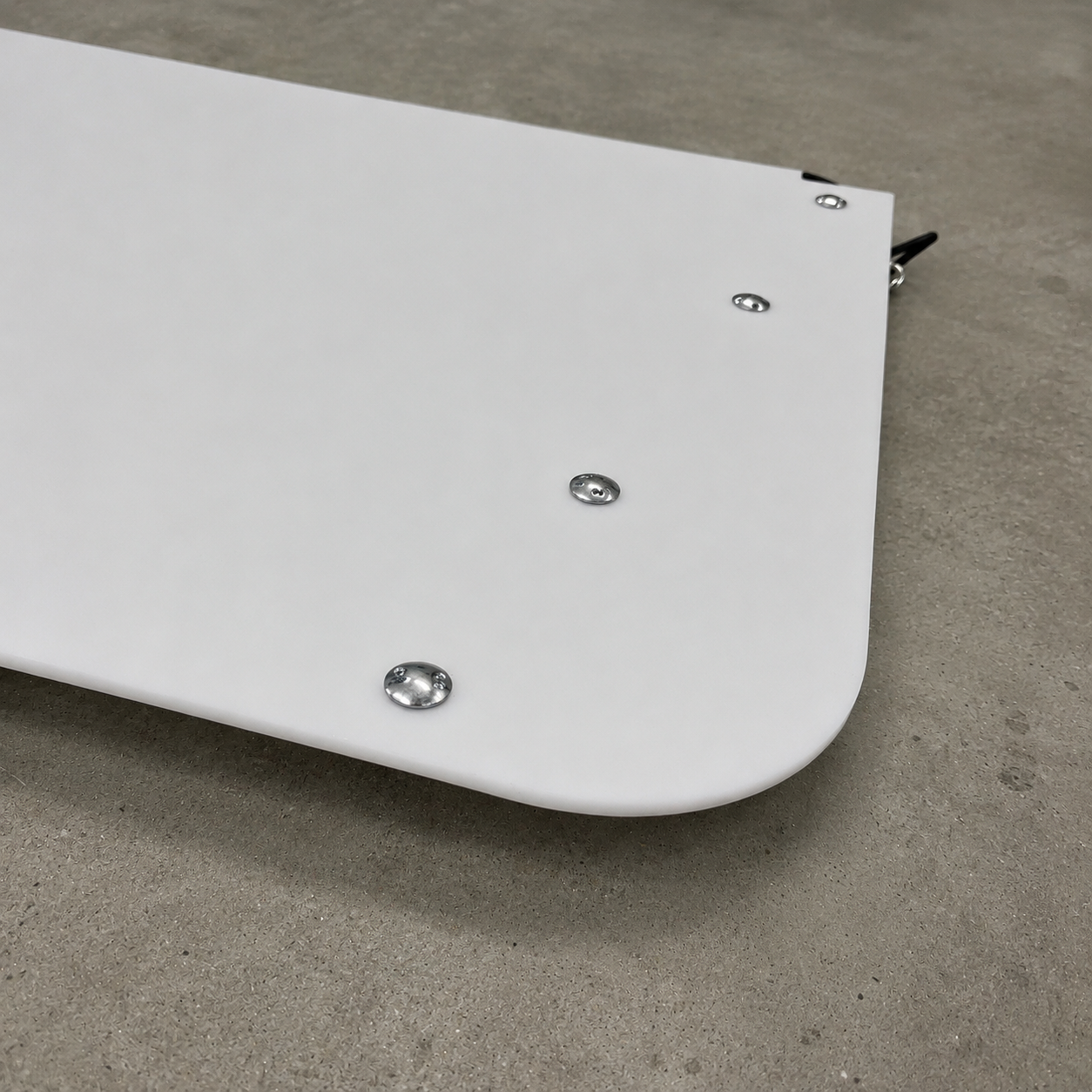 GR Yaris rear suspension guard underside shown in close up detail with rounded anti-wear bolts