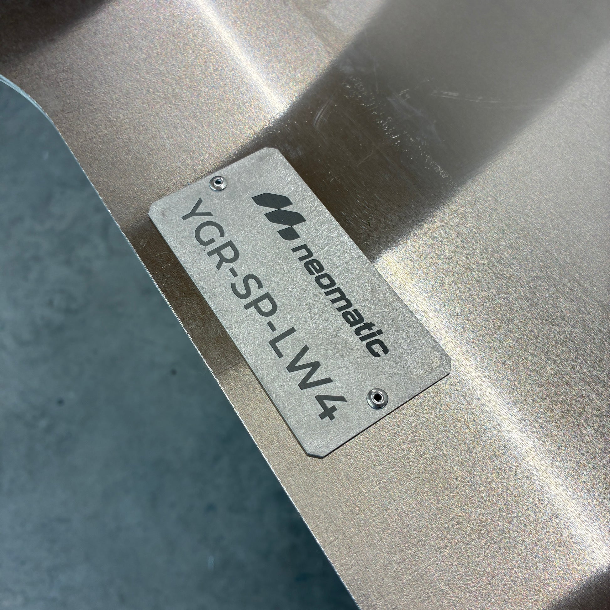 Close up of aluminium product tag on GR Yaris lightweight skid plate
