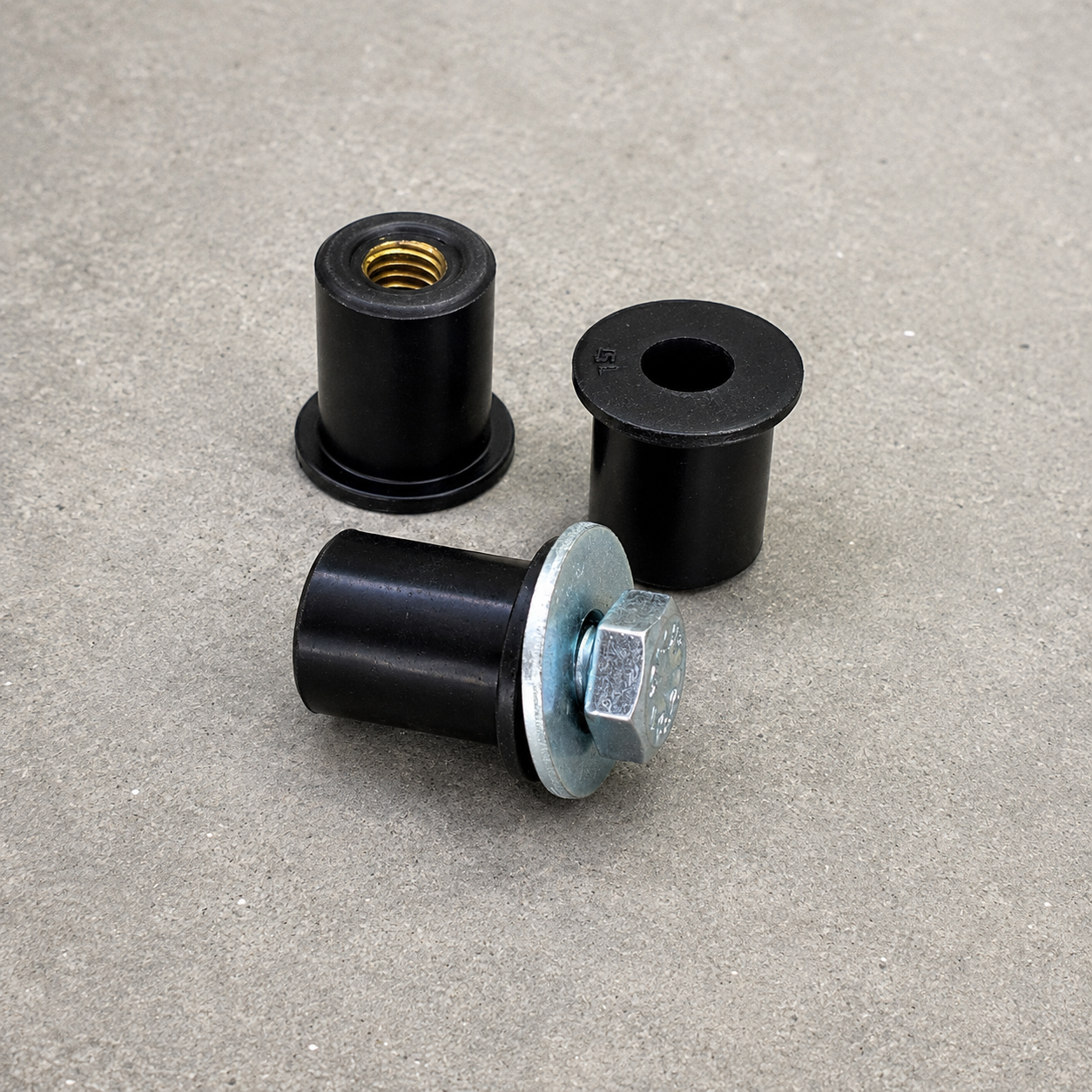 Mounting hardware supplied with the Toyota GR Yaris Side Skirt Guard Kit showing the specialized rubber nuts used in this kit