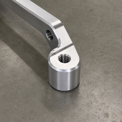 Close up of the machining detail on the GR Yaris Small Brake Kit caliper mounting adapter