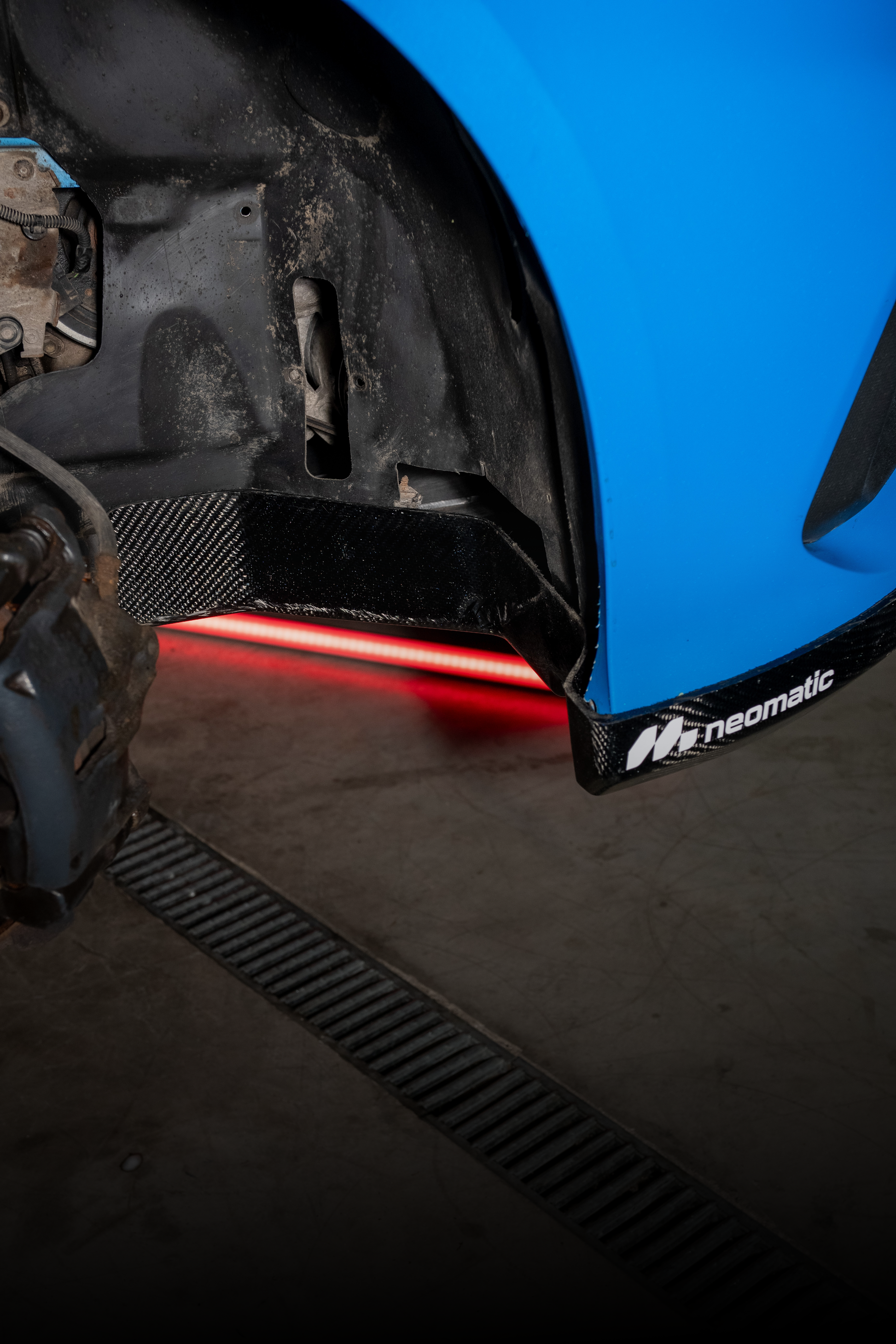 Neomatic Focus RS Sump Guard Kit installed with great fitment inside the wheel well 