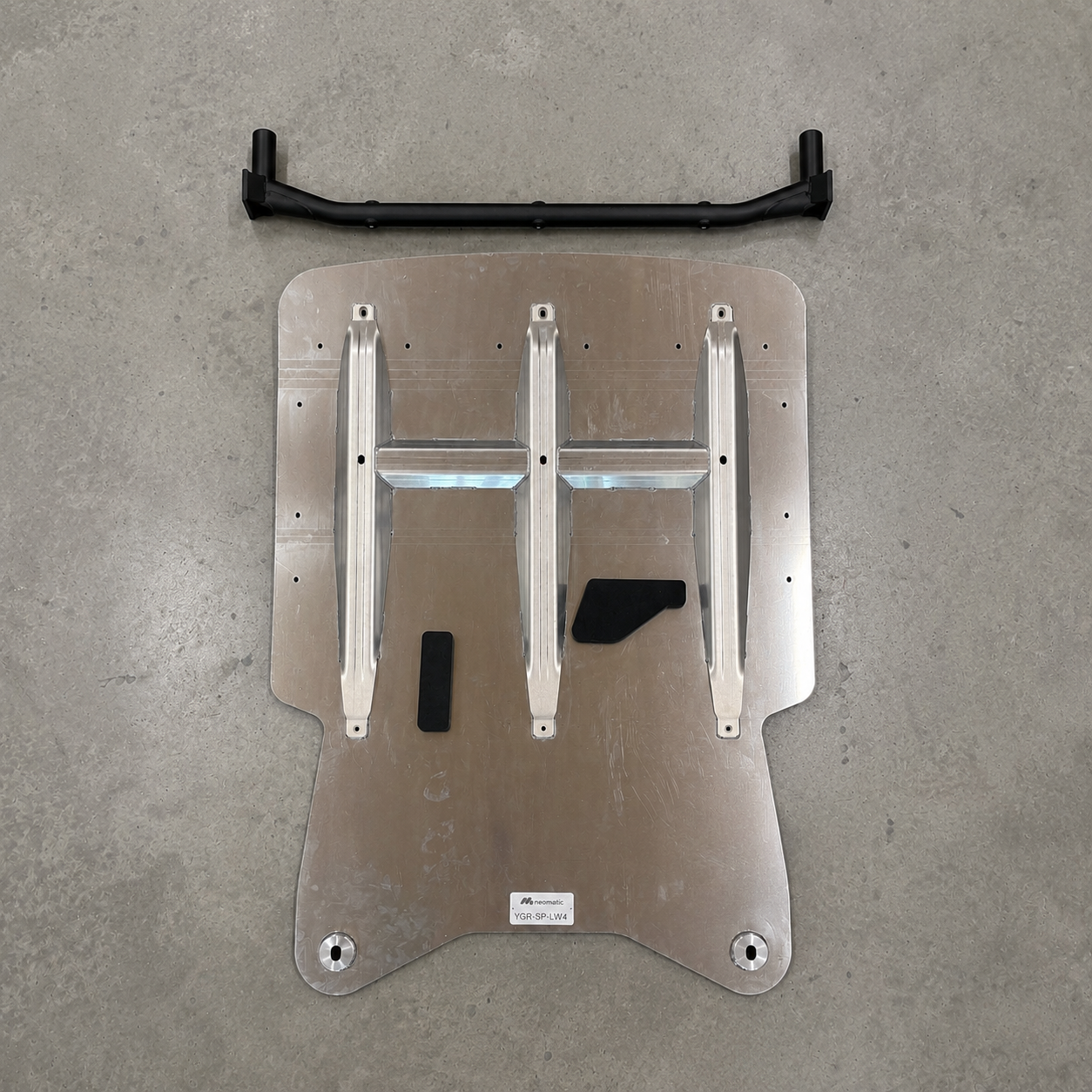 Gen1 GR Yaris skid plate kit underside with welded reinforcement ribs and protective foam pads for engine oil sump and gearbox.