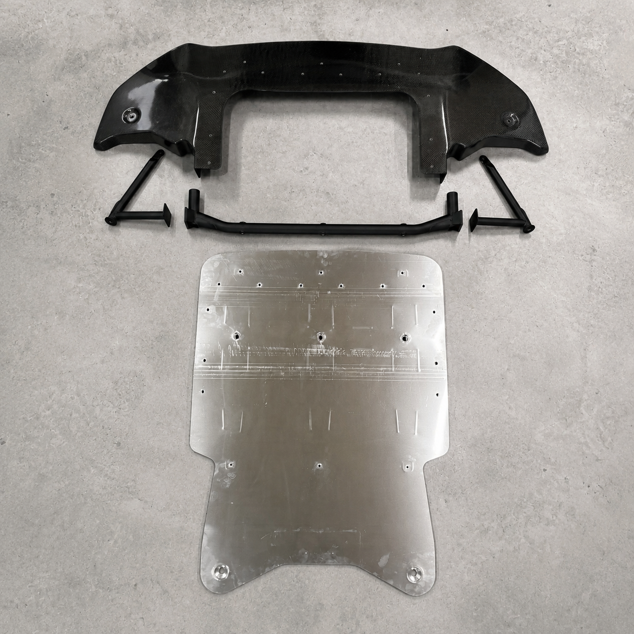 Gen1 GR Yaris Sump Guard Kit components including aluminium skid plate, steel mounting bar and composite front underguard