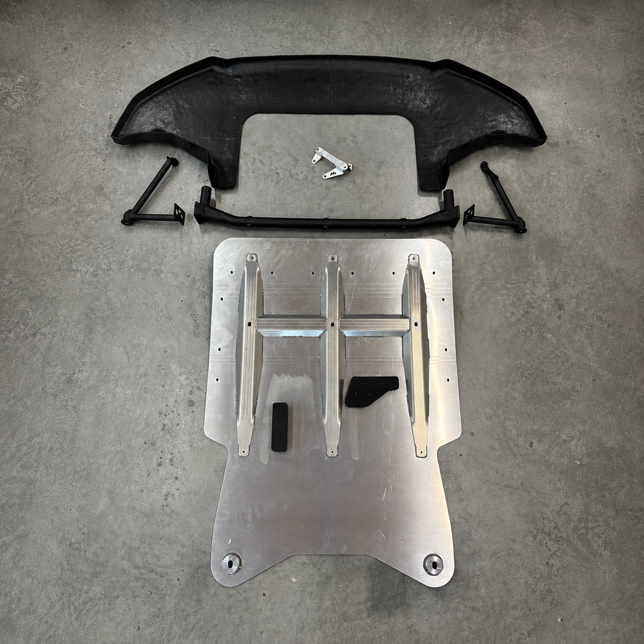 Gen2 GR Yaris Pro Sump Guard Kit with reinforced aluminium skid plate, mounting structure, composite front underguard and gearbox cooler bracket