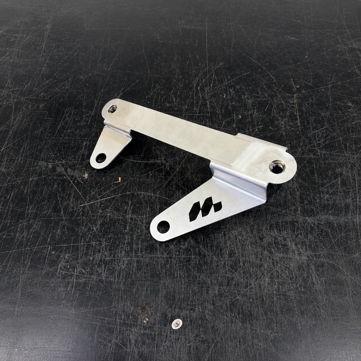 Gen2 GR Yaris stainless steel gearbox cooler relocation bracket included with Neomatic sump guard and skid plate kits